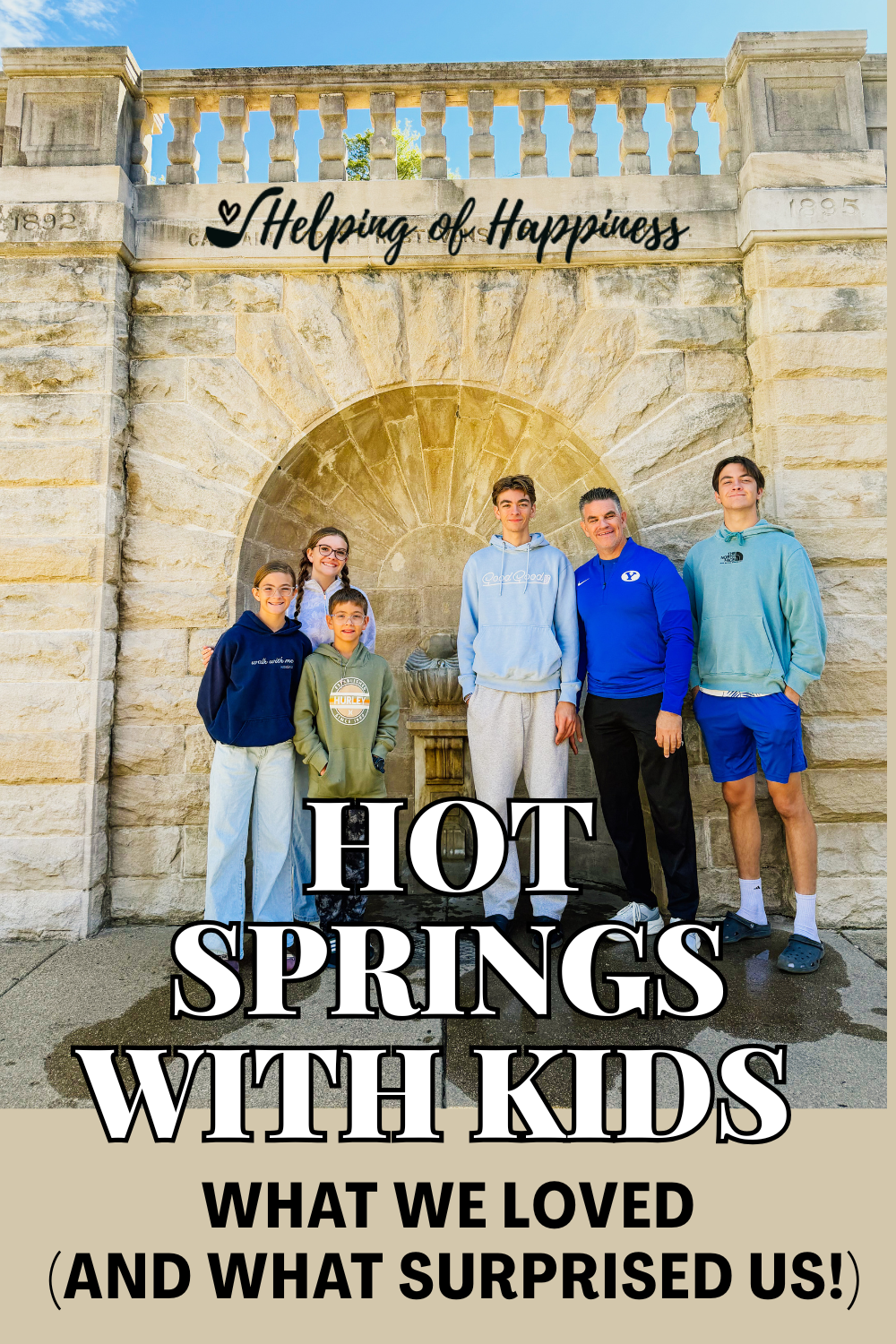 Family posing at a historic stone spring fountain in Hot Springs, Arkansas, with Pinterest text “Hot Springs with Kids: What We Loved and What Surprised Us.”