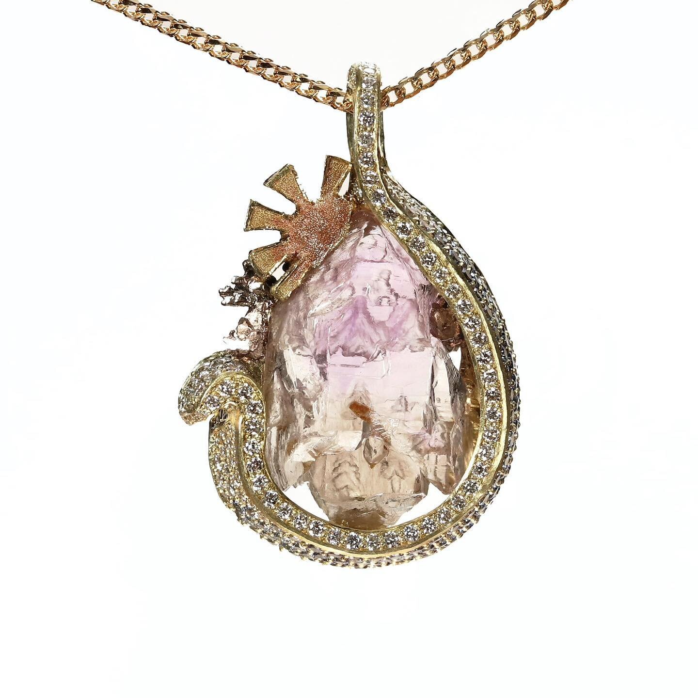 So a happy to share this very special piece!
This pendant was cast in 18k green gold and has an 18k rose and yellow gold sun with 18k white gold Clouds and 18k brown gold mountains.. these all extend from the reverse intaglio scene representing a pan