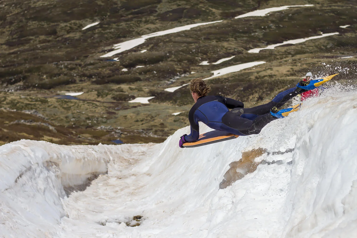 Shane Ackerman diving into Mother Natures natural half pipe. Photo: Craig Brokensha
