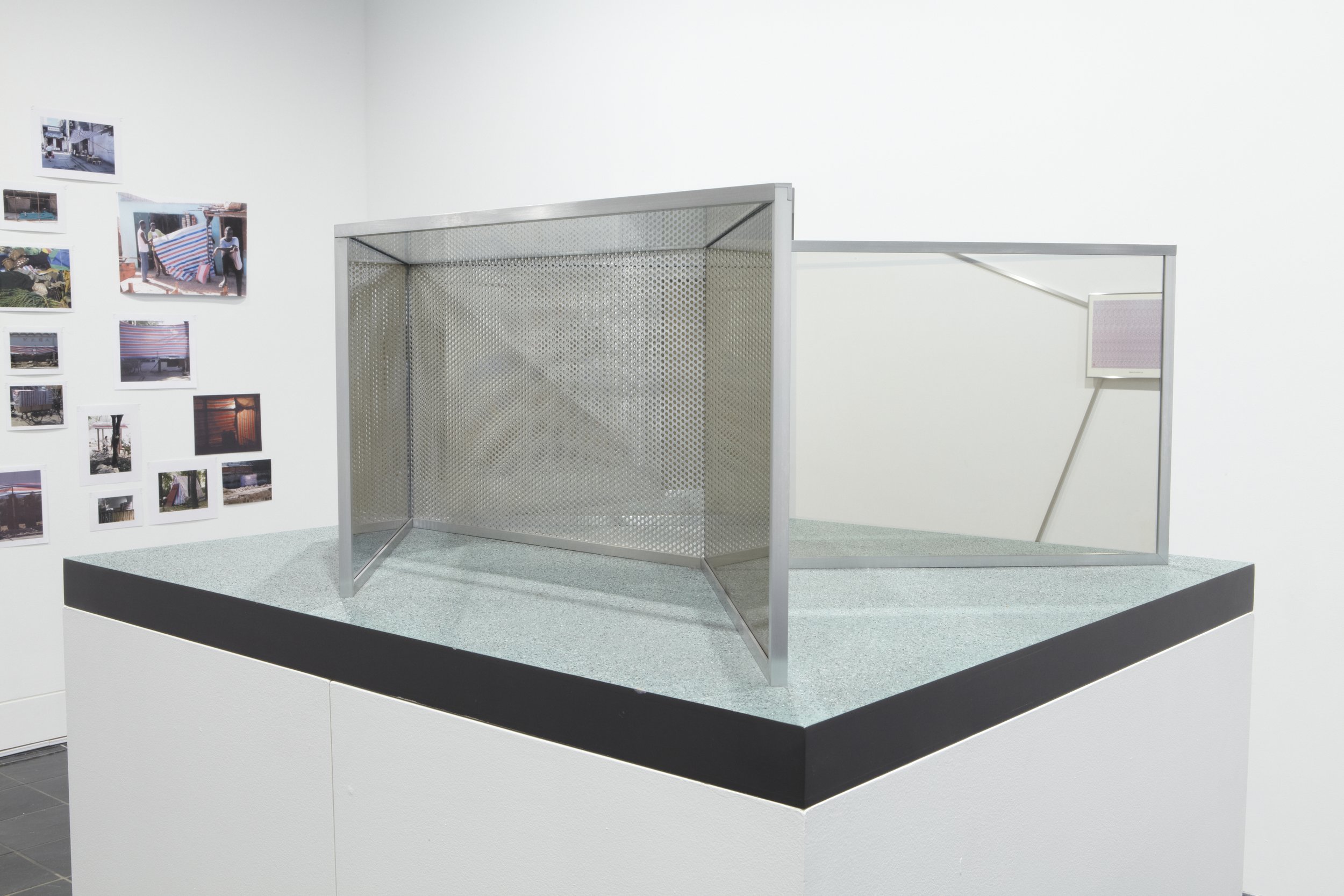 Dan Graham,&nbsp; Serpentine II , 1995, two-way mirror, transparent glass, punched aluminum, aluminum,&nbsp;14 x 36 x 30 inches. Courtesy of Marian Goodman Gallery, New York. 