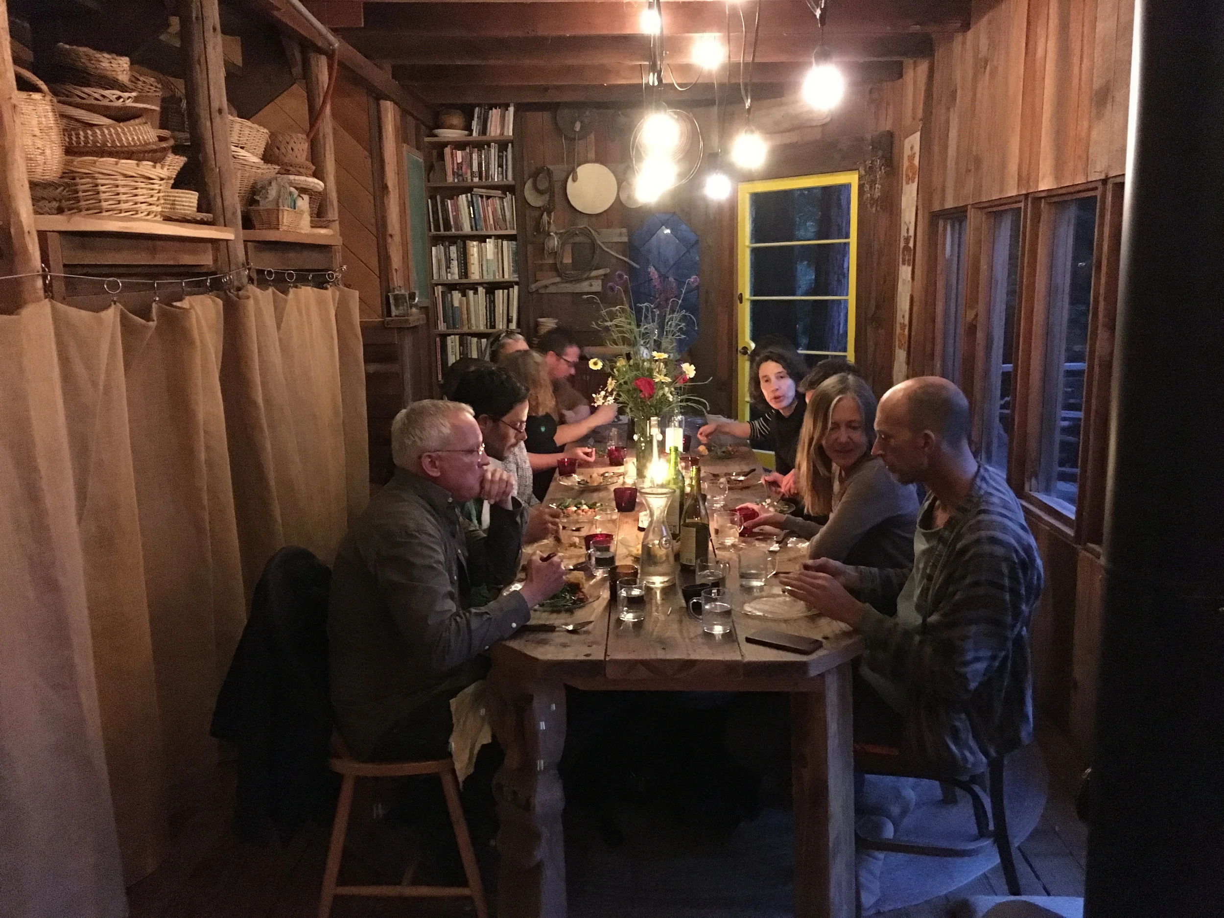  Dinner with participants and Fritz Haeg in Dawn Cabin, the communal locus of Salmon Creek Farm, June 8, 2018. 