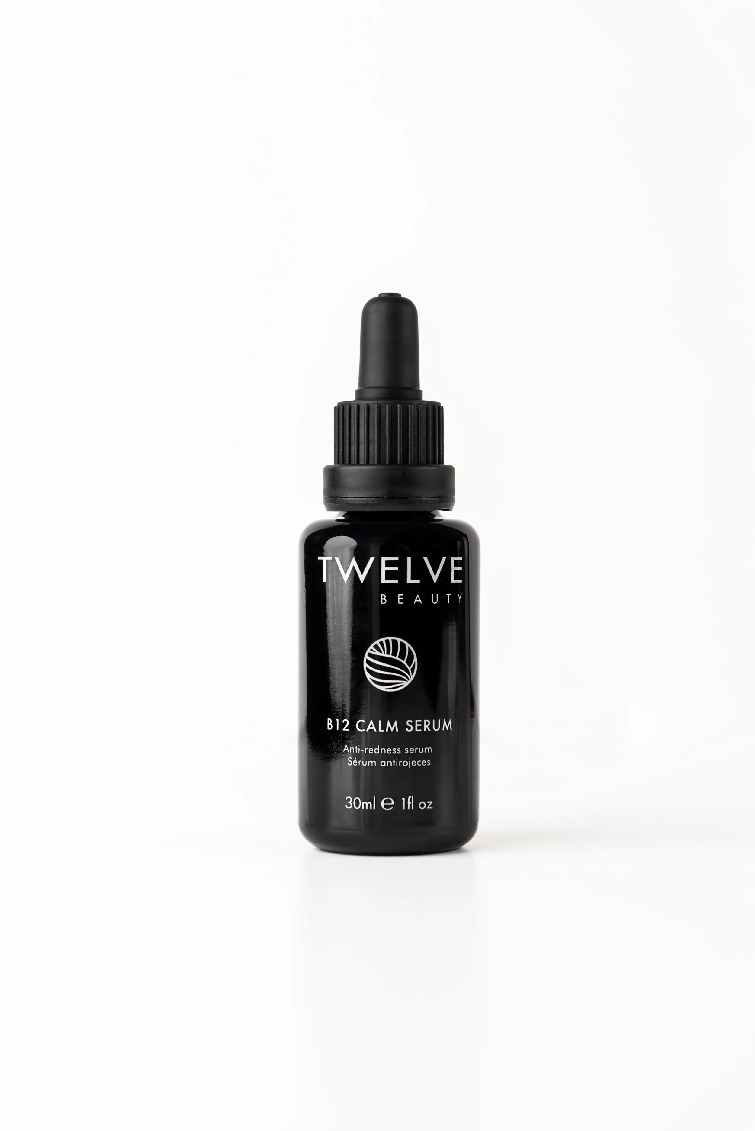 A sleek miron dropper bottle of Twelve Beauty B12 Calm Serum on a clean white background