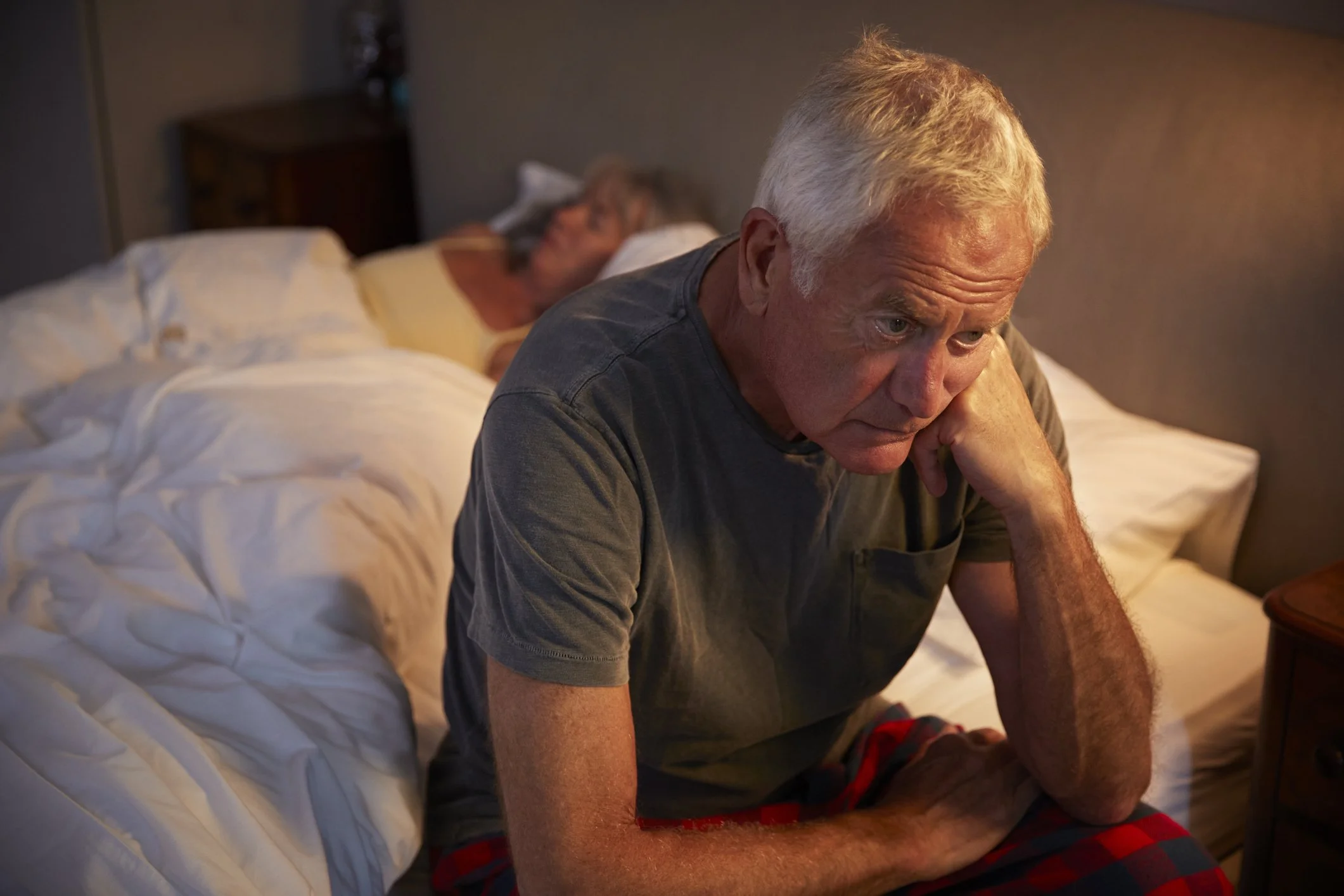 Worried-Senior-Man-In-Bed-At-Night-Suffering-With-Insomnia-864363472_2124x1416.jpeg