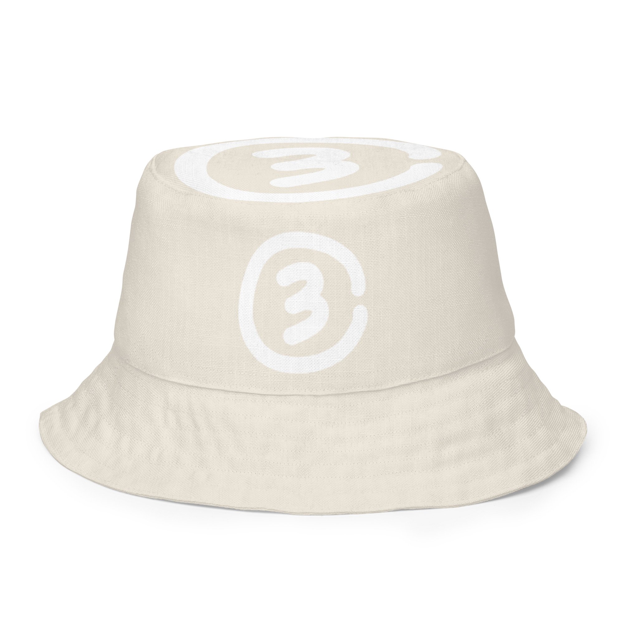 Front outside view CIRCLE3 Reversible Bucket Hat – Range Cream showing large Circle3 logo on the crown and a smaller medallion logo front and center.