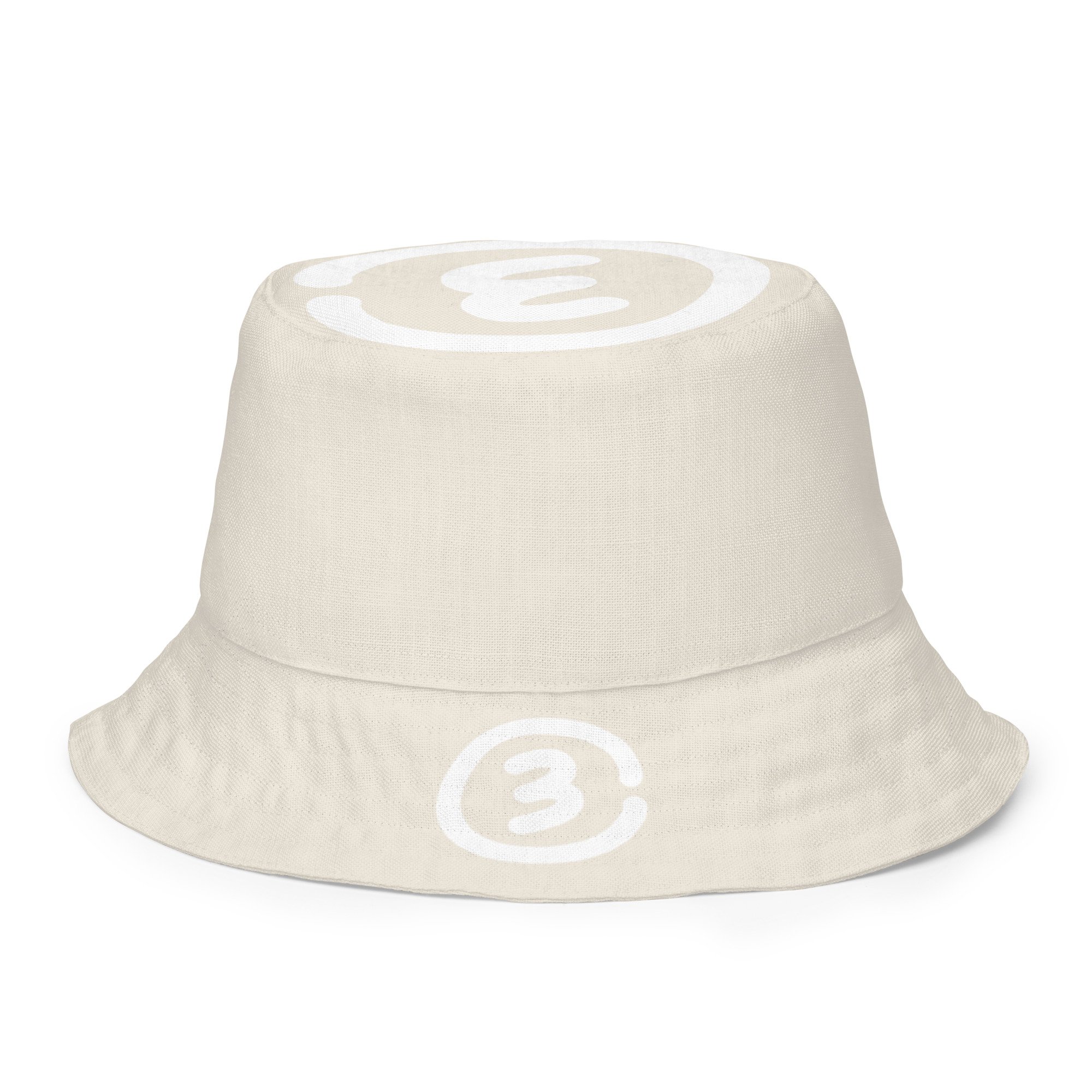 Back outside view CIRCLE3 Reversible Bucket Hat – Range Cream showing large Circle3 logo on the crown and a smaller medallion logo front and center.