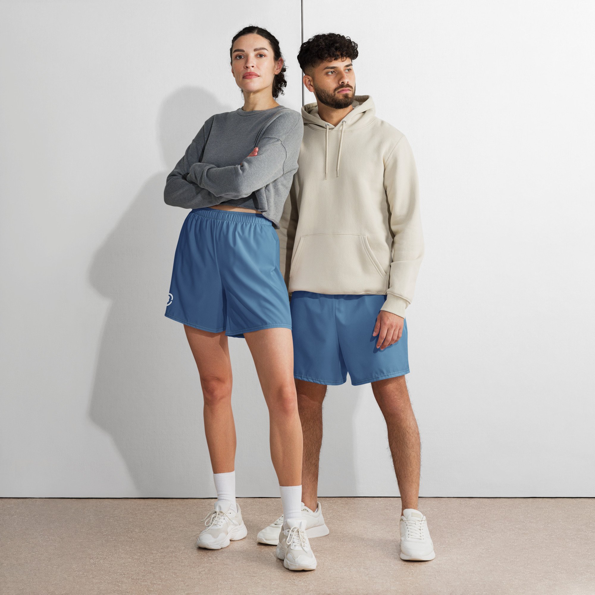 2 models wearing shorts with CIRCLE3 branding in Texas colorway