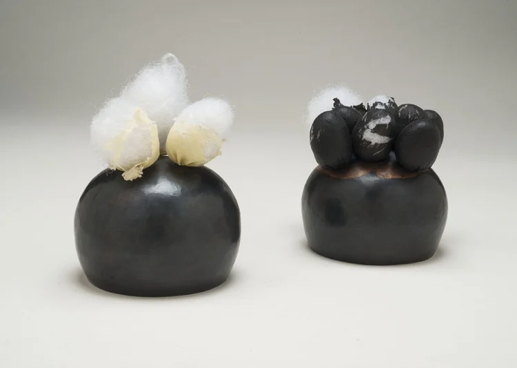 Fraternal Twins , mixed media, 2.5” x 3” x 3” (left) 2.5” x 2.5” x 2.5” (right), 2014 (photo by artist)