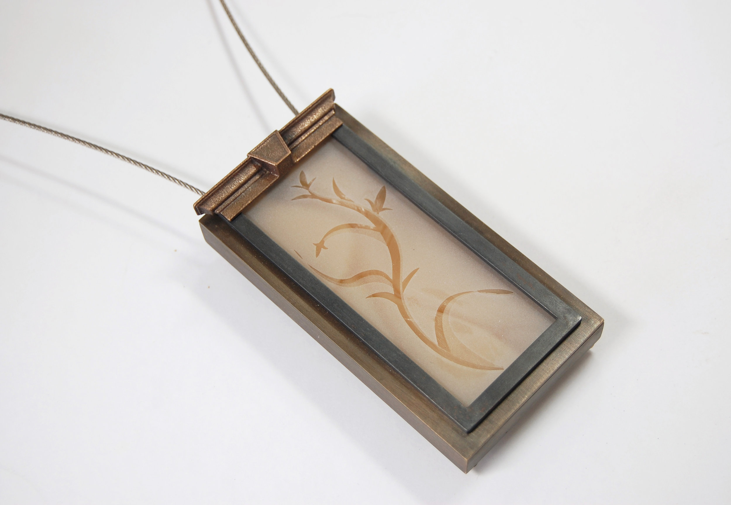  Figure 13:  Springwood,  cast bronze, nugold, steel cable, glass, silicone, 4 1/8” x 2 1/8” x 7/8” 