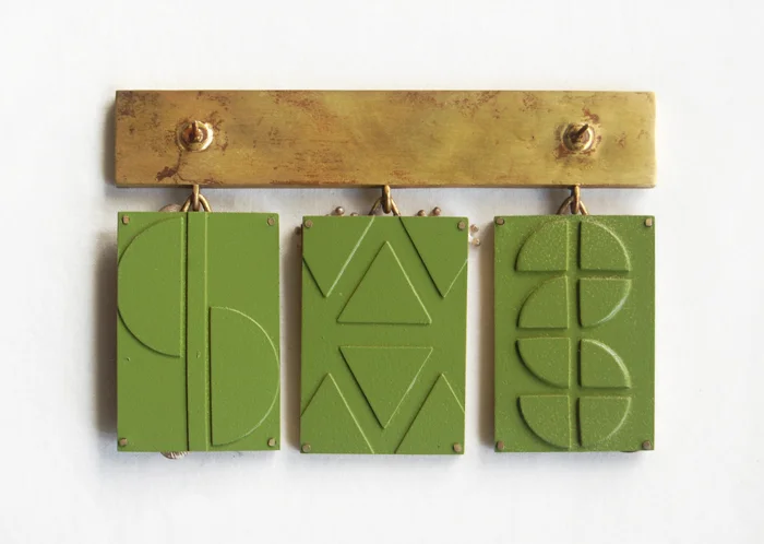 Dear Mom, brass, sterling silver, wood, photos of my mother, spray paint, 4" x 2¾" x ¼", 2017