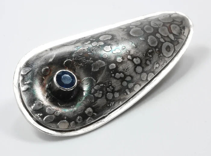 Pillow pendant, sterling silver, Thai sapphire, ¾" x 1¾", 2010