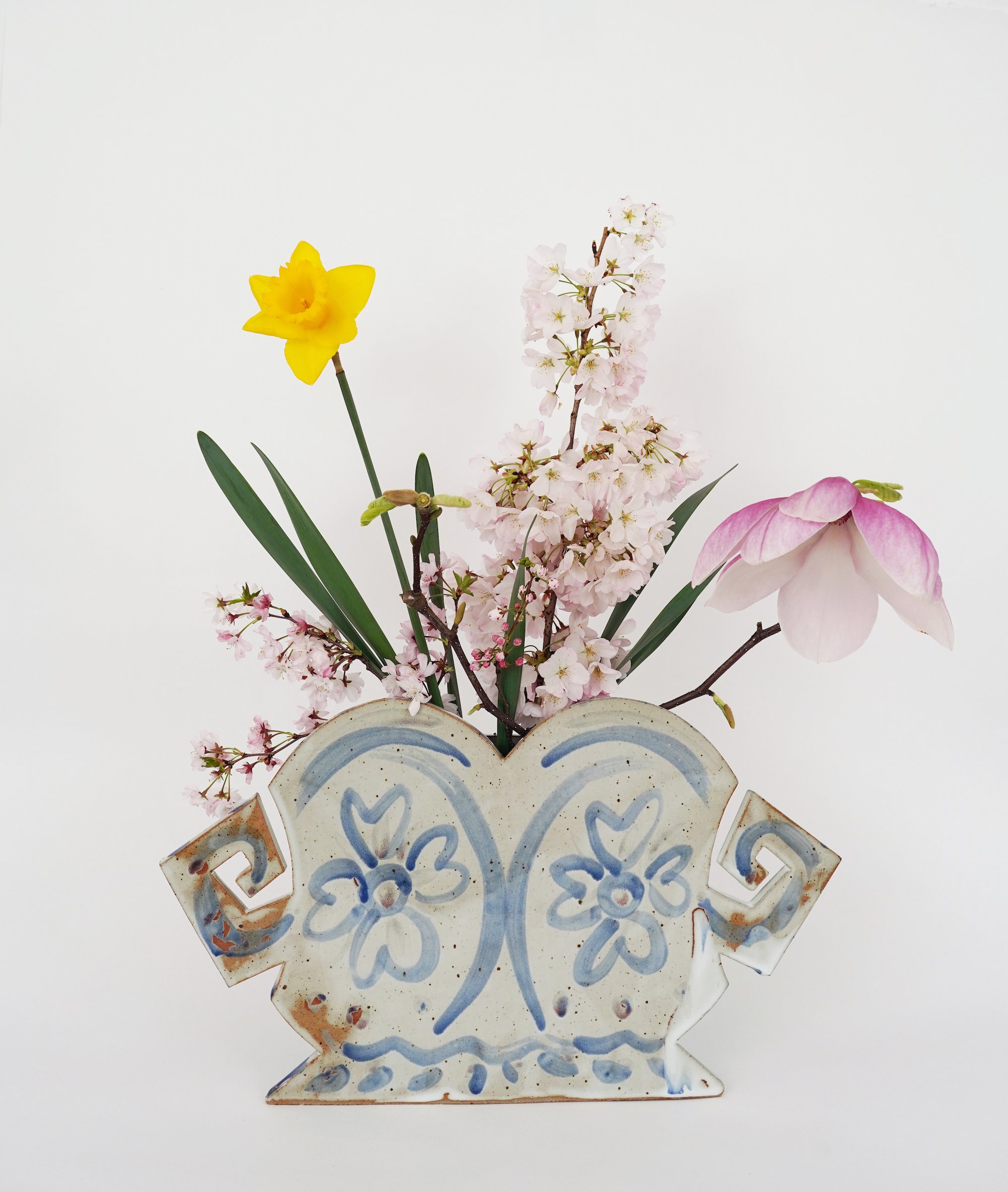 Double Strongman Vase with spring flowers