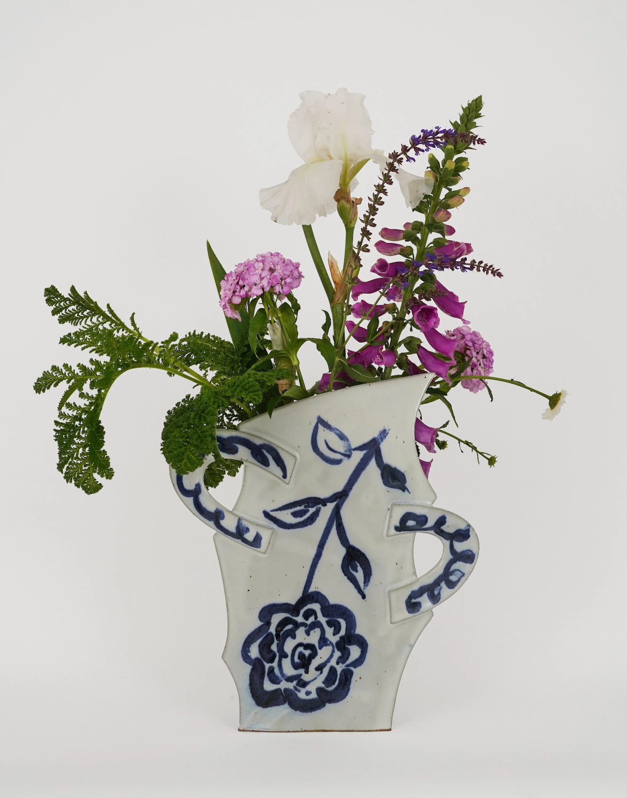 Upside Down Vase with garden flowers