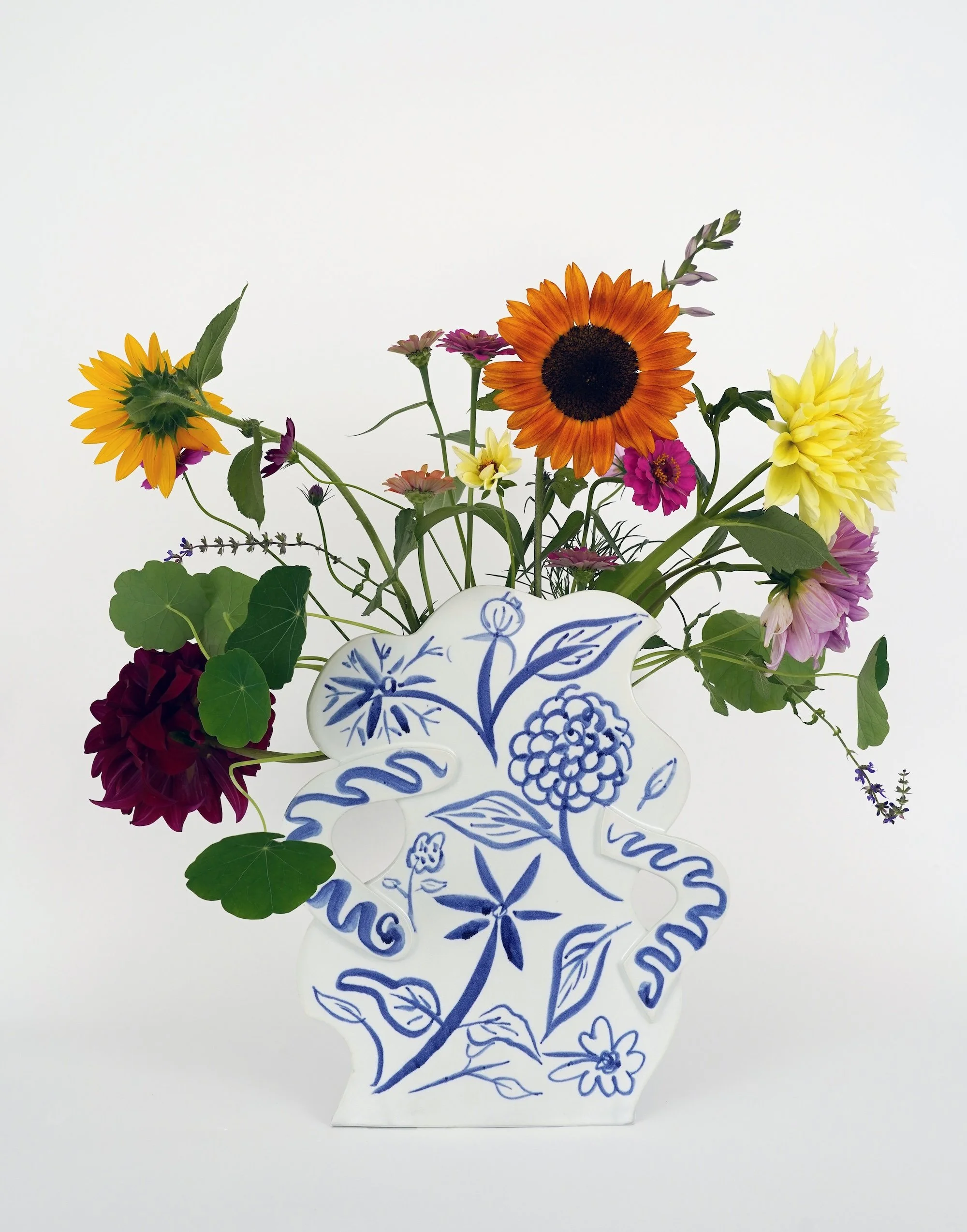 Growing Garden Vase with summer flowers 