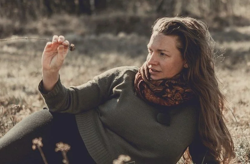 confident woman communicating with plant
