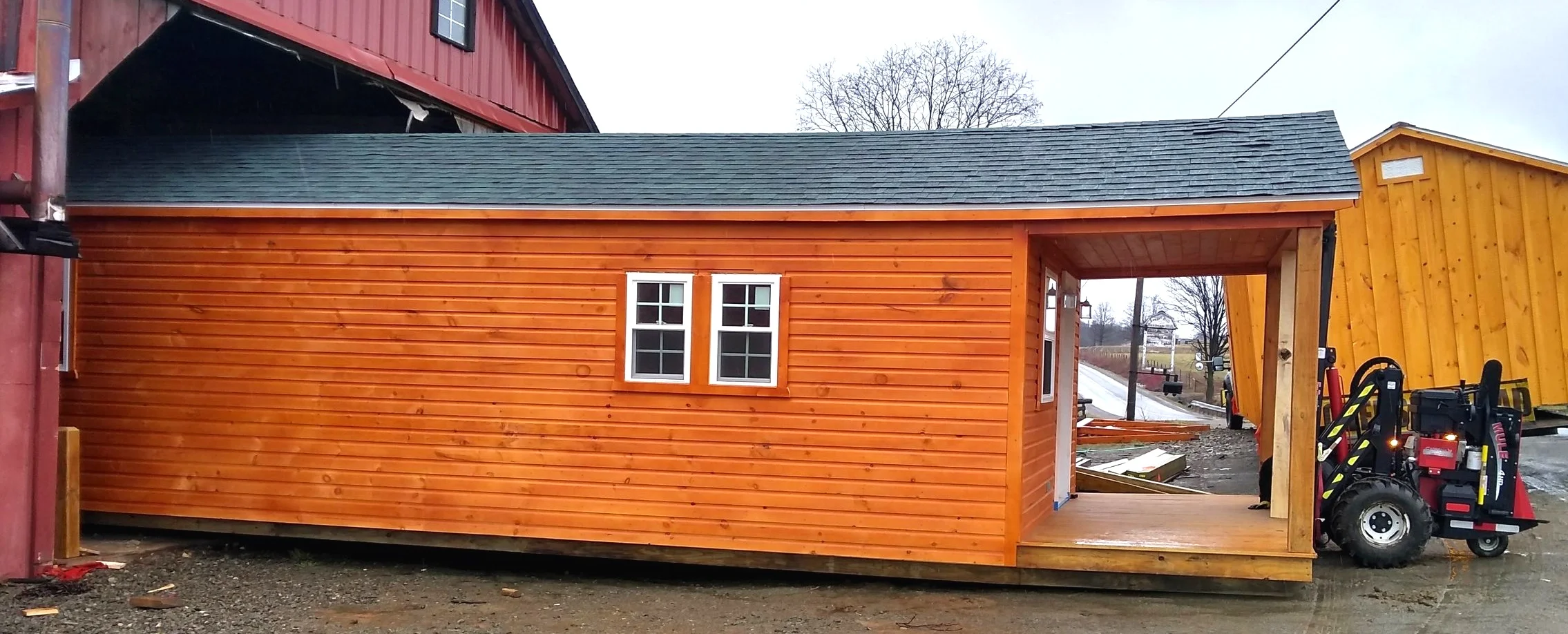 Mule moving a 13 X 36 cabin