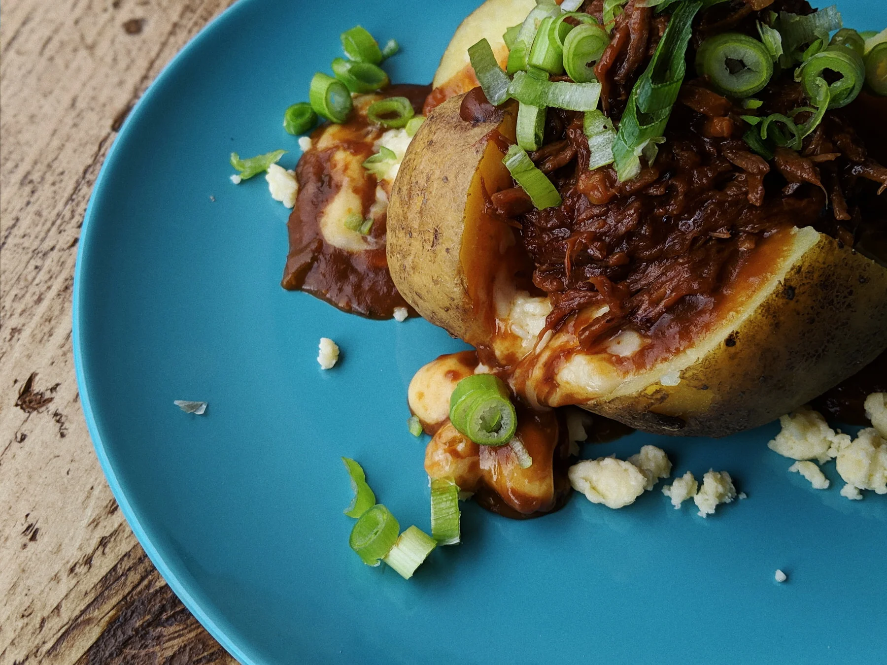 The Carolina baked potato poutine: pulled beef, spring onions and cheese curds.