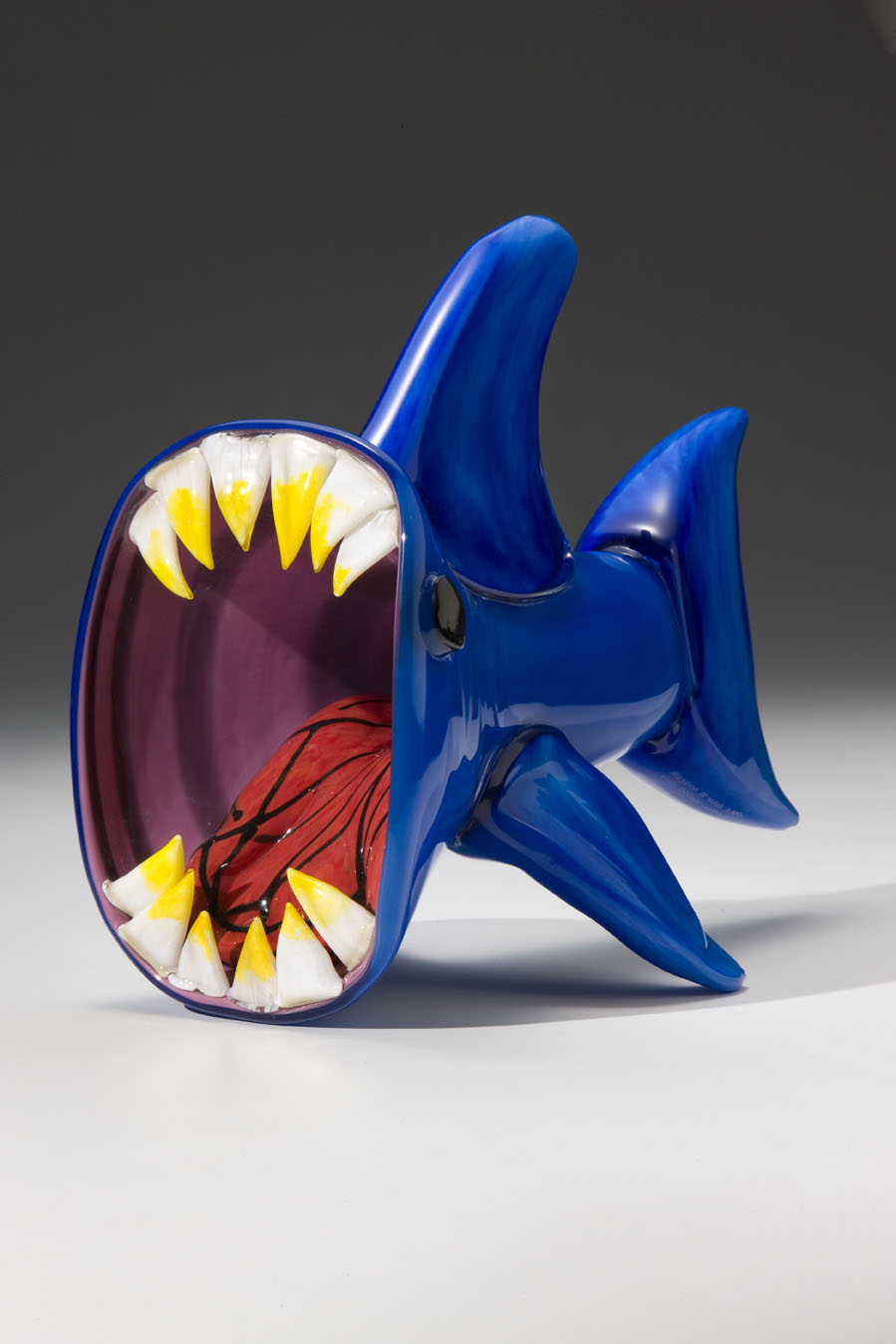  Designed by Erica Hankins (age 8), made by Museum of Glass Hot Shop Team.&nbsp; Shark Attack!,  2007.&nbsp;Blown and hot-sculpted glass;&nbsp;11 x 9 x 13 1/2 in.&nbsp;Collection of Museum of Glass, Tacoma, Washington, sponsored by Joseph N. Walter a