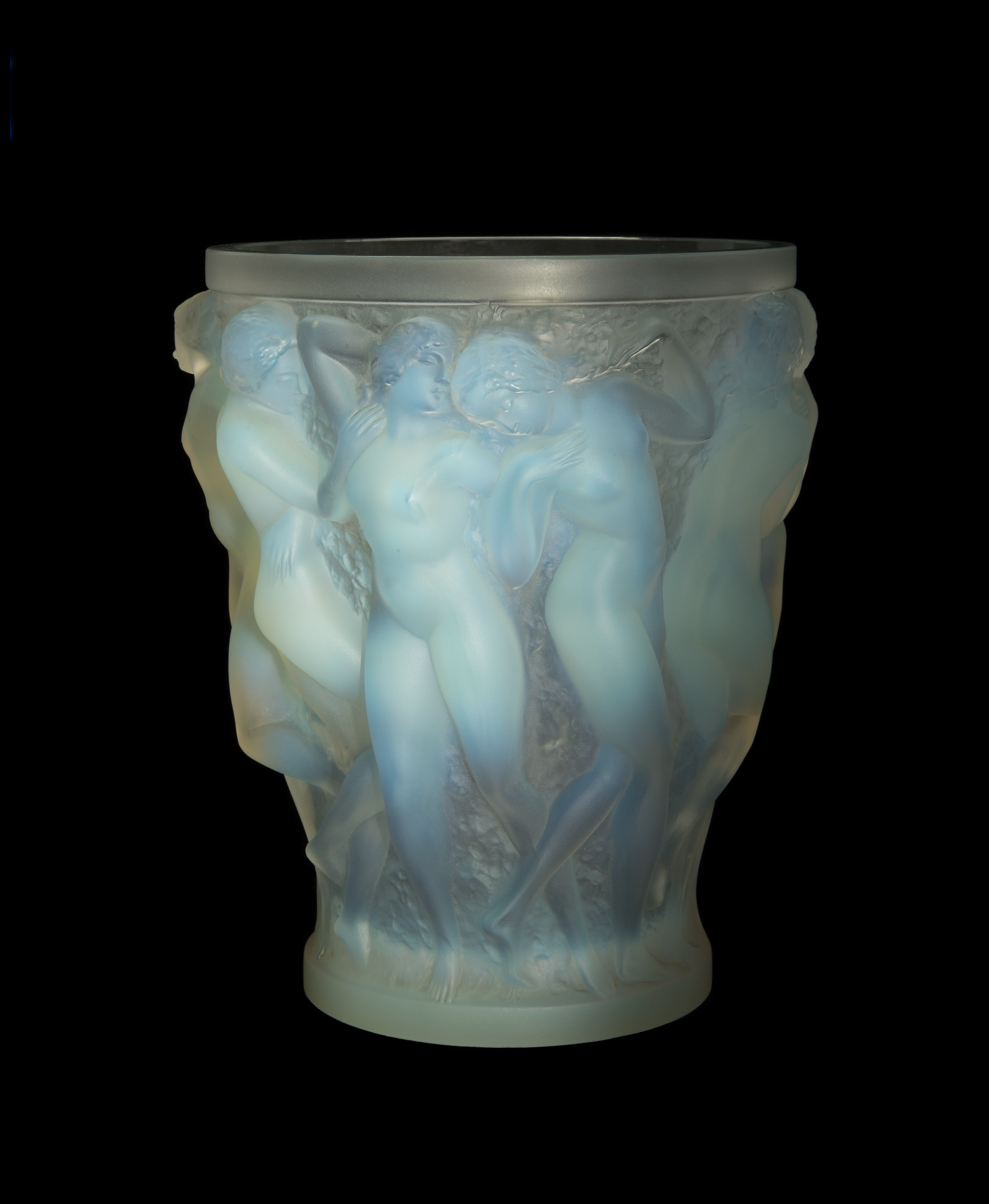  René Lalique (French, 1860–1945).  Vase Bacchantes (Bacchantes Vase).  Press-molded opal glass; 9 1/2 x 8 3/4 in. Collection of David Huchthausen. Photo by Llyod Shugart. 