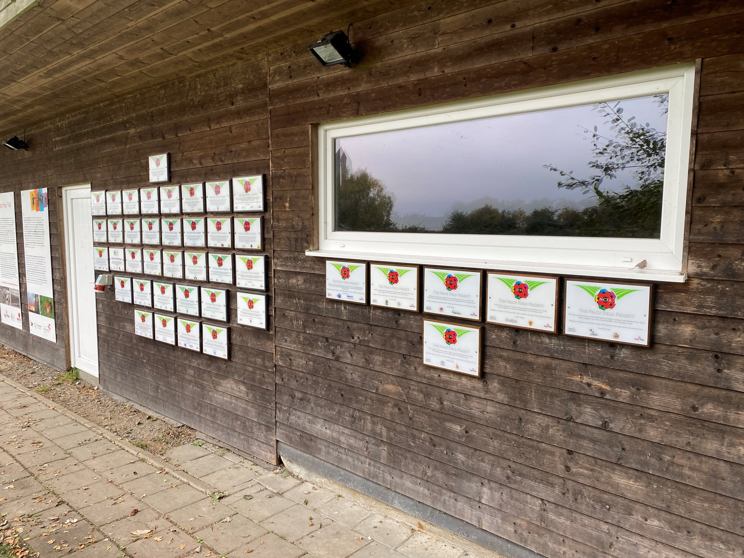 PEACE FIELD PROJECT PLAQUES AT FLANDERS PEACE PITCH 2021.jpg