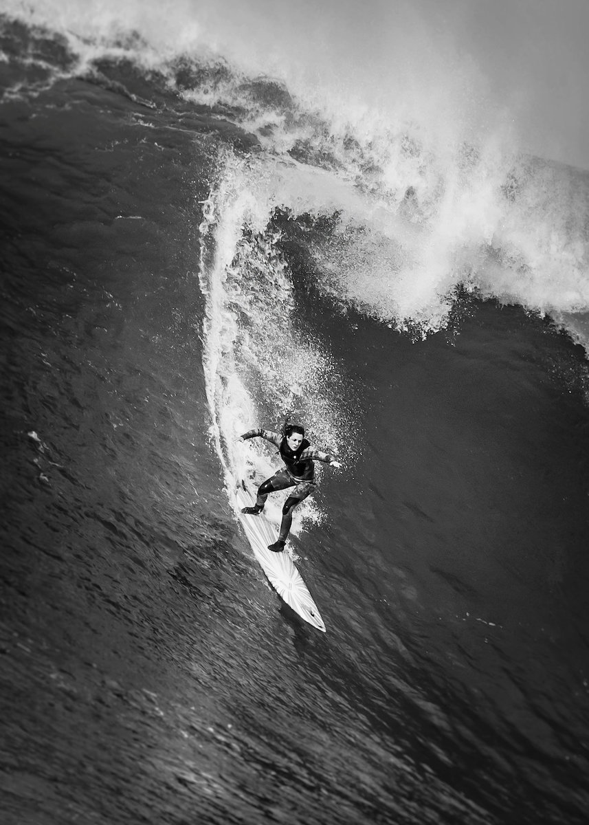 Bianca Valenti surfing the big waves at Maverick’s in December 2018. Photo by Dina Litovsky/Redux, for The New York Times.