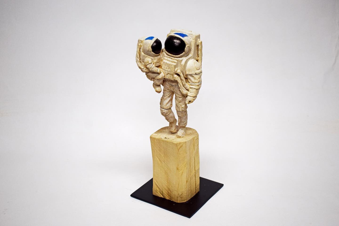 Another super cool new sculpture arriving from the German artist @p.liehr arriving soon! 

Astronaut With Child, 12x5x5, carved wood.