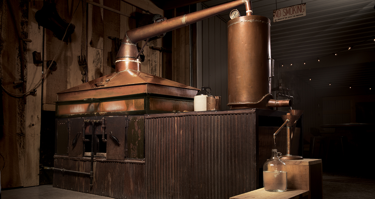  Our square copper pot still is the heart of our distillery. 