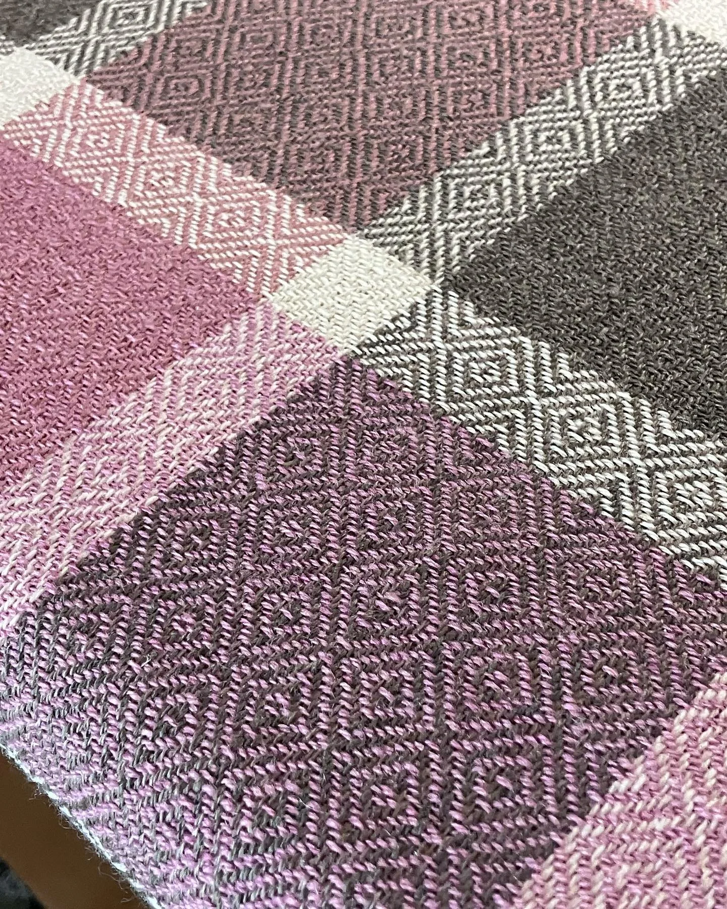 Such fun weaving this pretty cochineal pink and sumac grey goose eye blanket. This is the centre panel out of three. 
The gorgeous Coopworth wool from Amherst Island, Ontario has beautiful lustre and character and is perfect for this type of blanket.