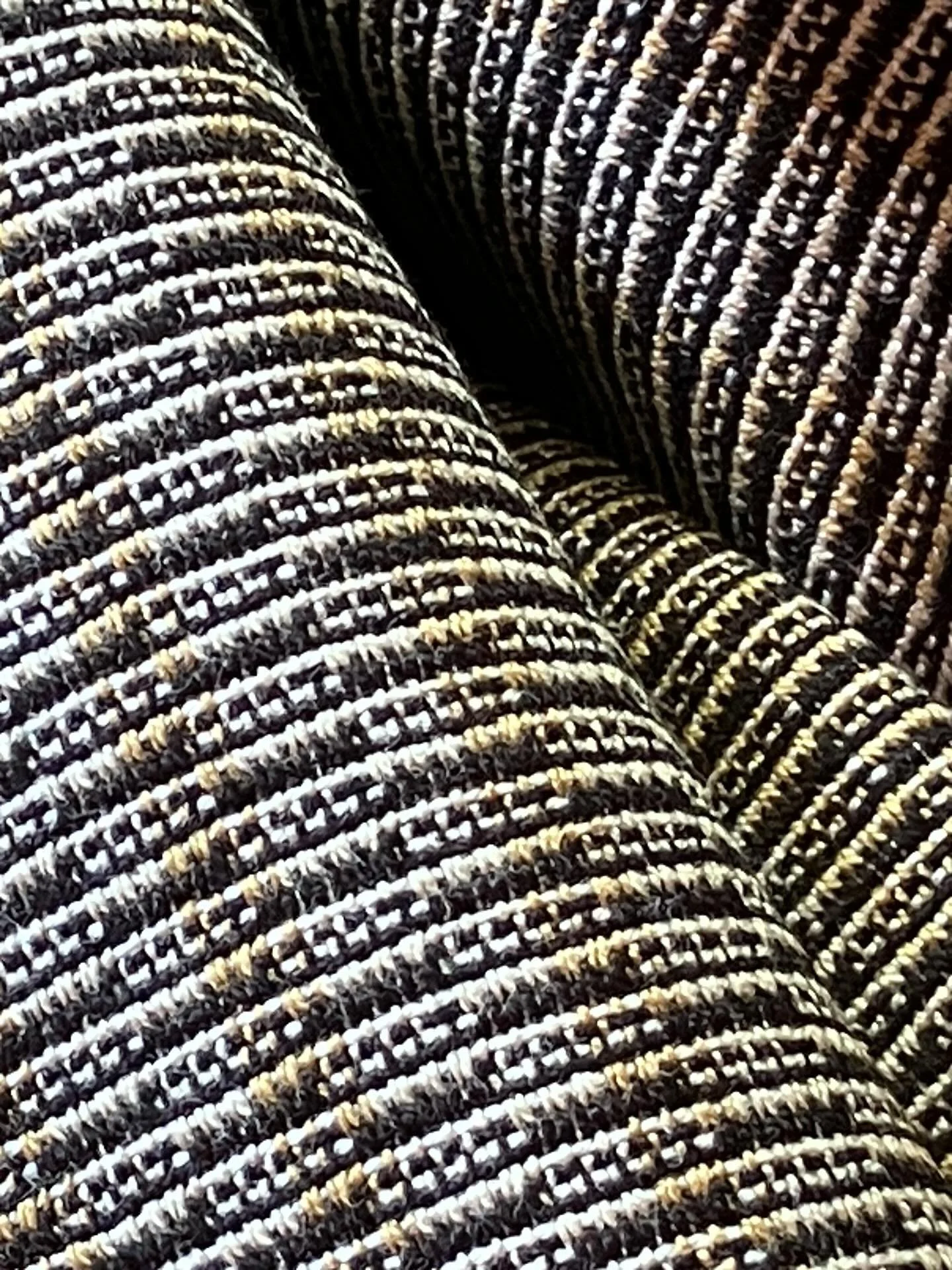 Custom woven and dyed cotton upholstery fabric for a 1961 DKW Junior car.
As in most textiles that come off the loom, the fabric is checked for flaws. Because this pattern is quite busy, I missed a few areas with skipped threads when I was weaving. W