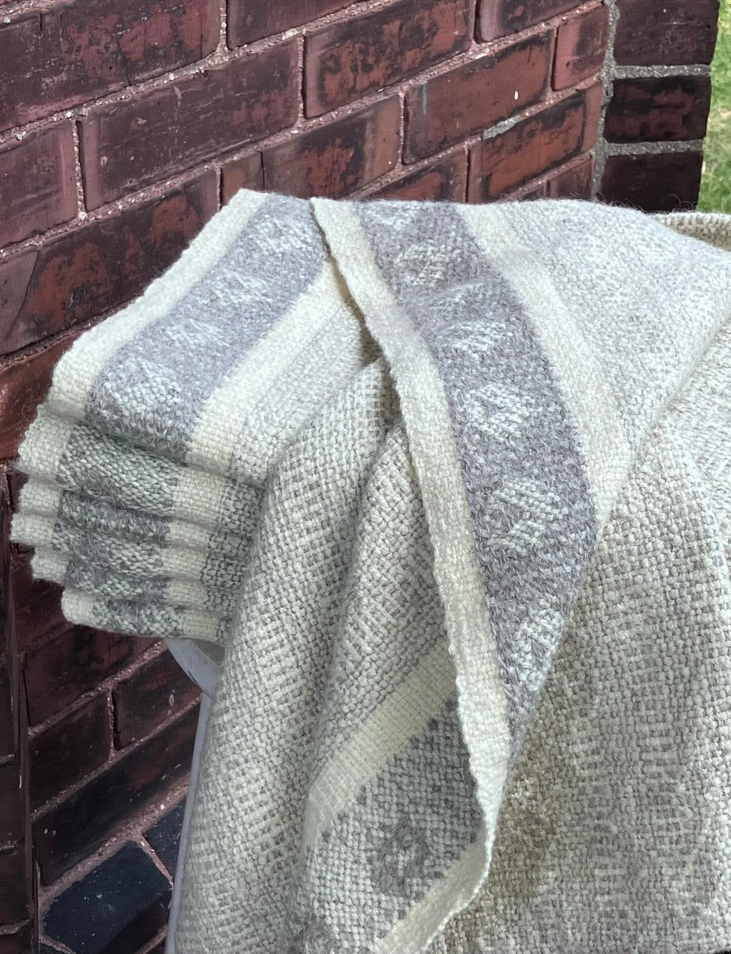 I&rsquo;m so happy with the way these Cotswold &lsquo;Lamb Border&rsquo; Baby blankets turned out.
The reversible lambs are all lined up on one edge ready to help a wee babe fall fast asleep while the rest of the blanket is a cozy soft texture weave.