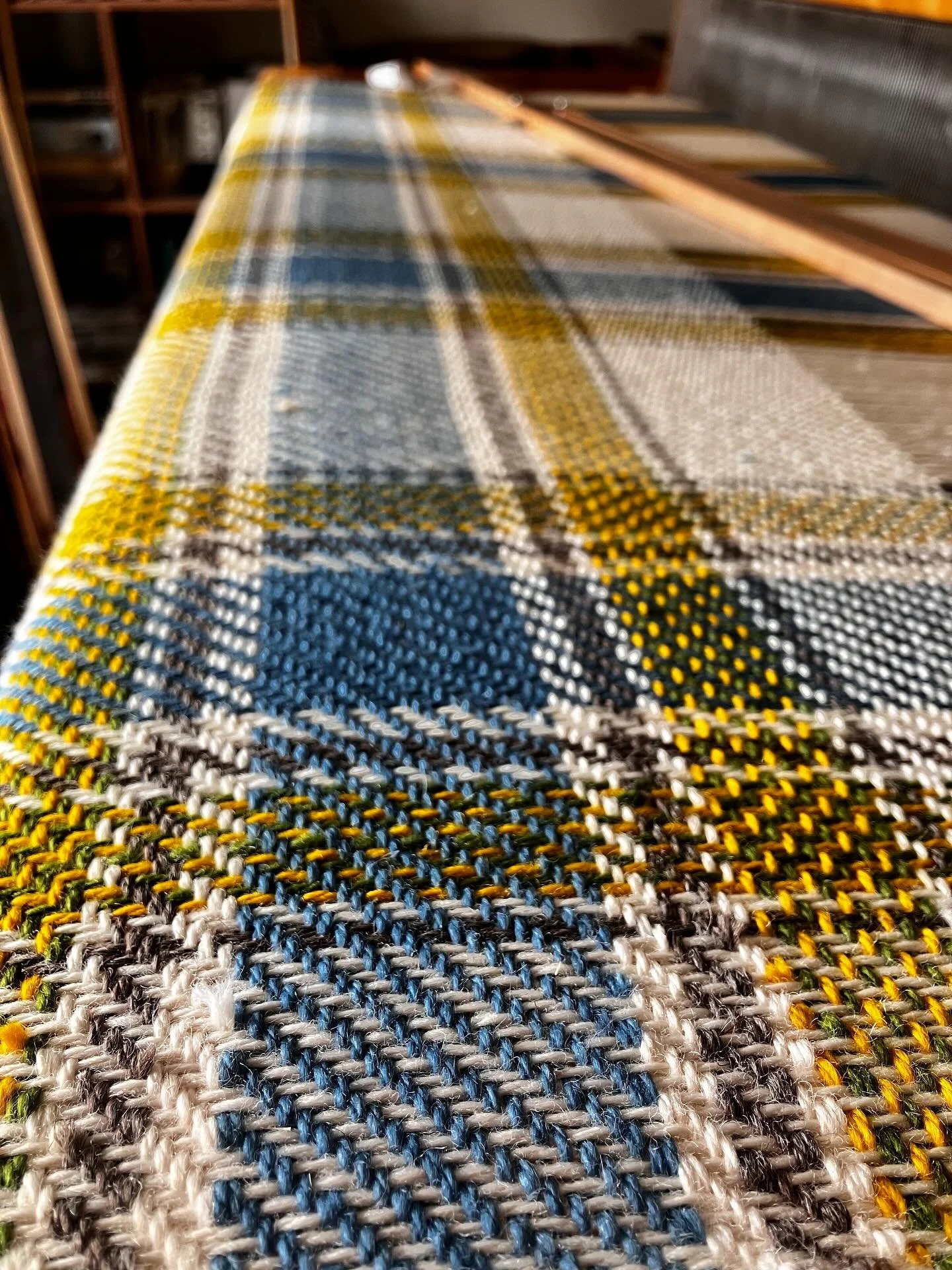 The sunshine on this Cottage Blanket makes me happy!

This pattern is inspired by our lovely Ontario cottage country. Blue sky and lakes; yellow sunshine; green coniferous trees and the brown of the Canadian Shield. All of these gorgeous colours are 