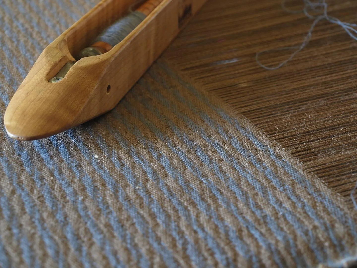 They sure don&rsquo;t make car upholstery like they used to.

This reproduction upholstery is for a 1940 Buick.  This optically wavy wool fabric is consistent with the Moderne aesthetic of the time period. Parallel streamlining can be seen in archite