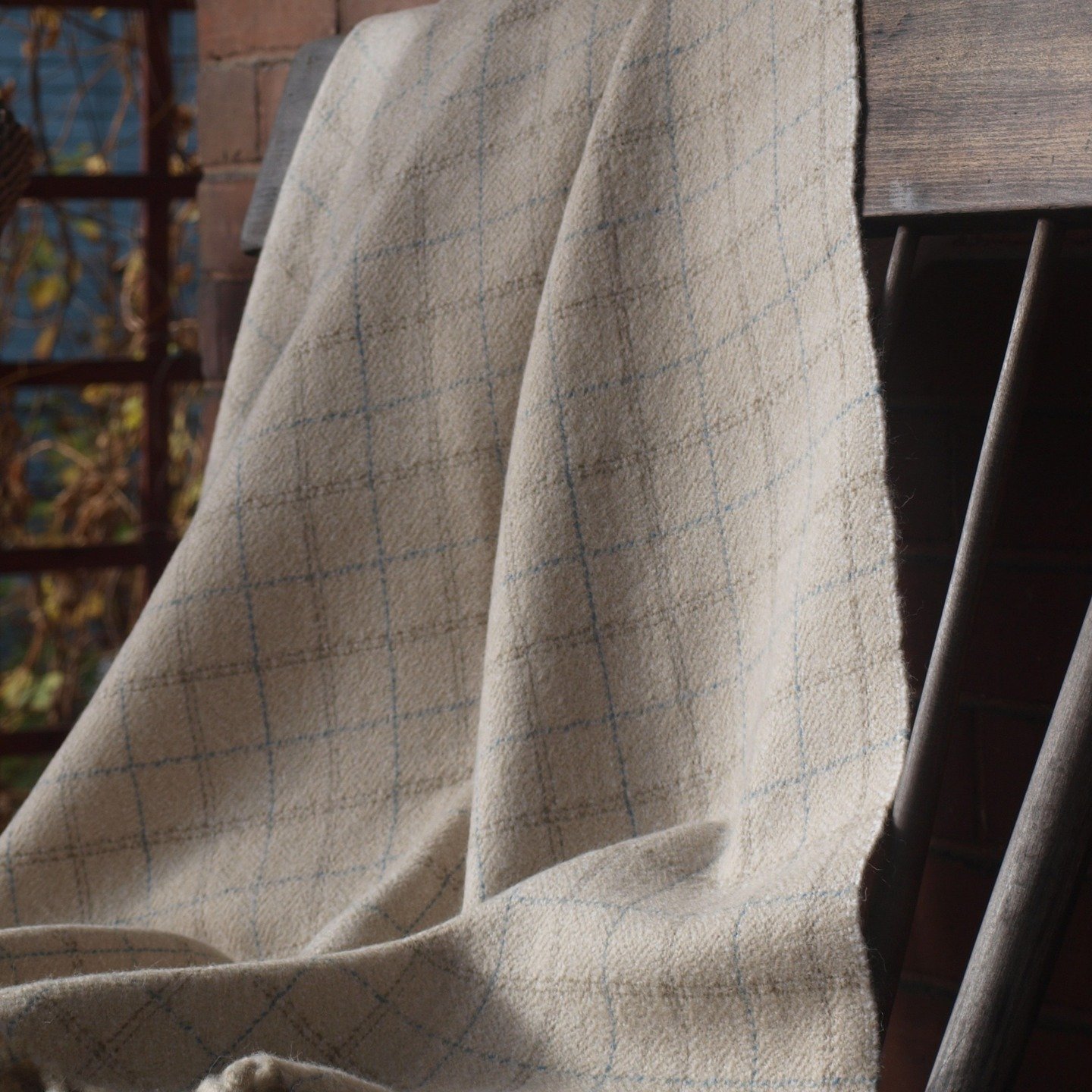 Wool herringbone in lovely neutrals and accent stripes I wove for a wedding shawl. This shawl was wove in a 3/1 twill which gave it extra plushness and two distinct sides.