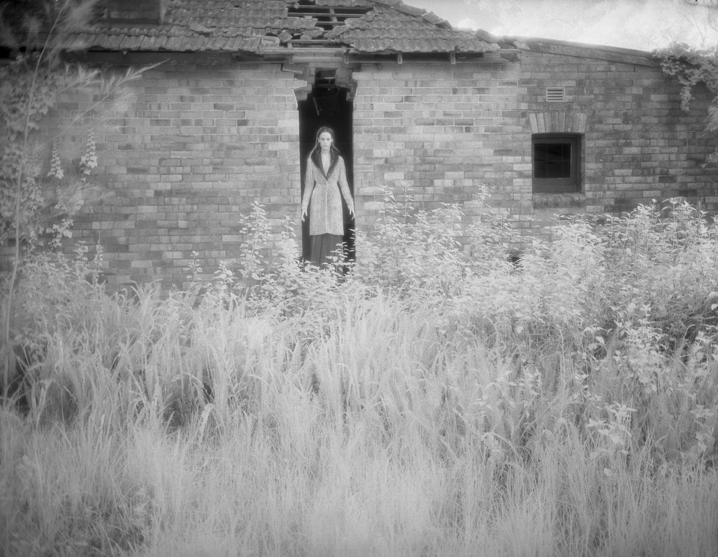 ghost girl in doorway.jpg