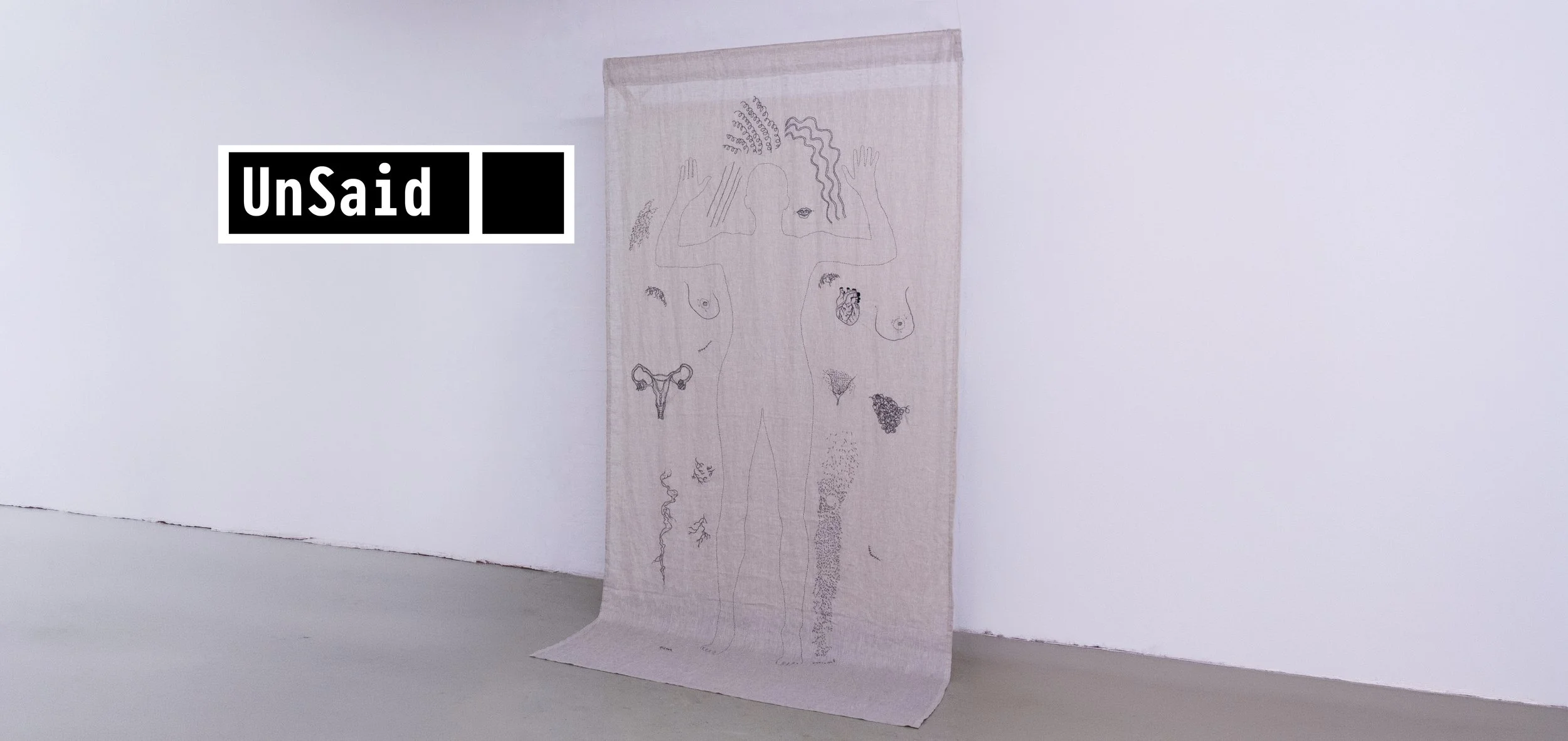 installation view logo ABSENCE at UnSaid FINAL copy.jpg