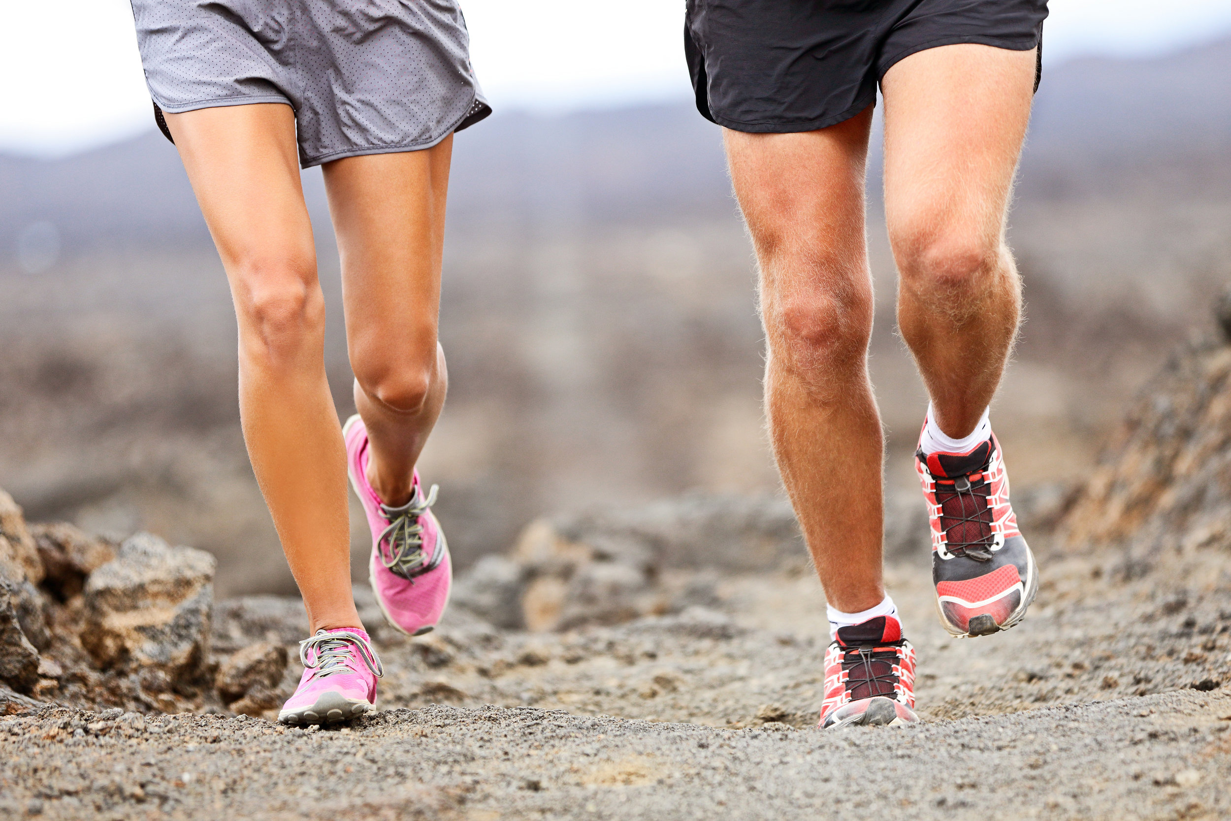 bigstock-Runners-running-shoes-on-trail-227561632.jpg