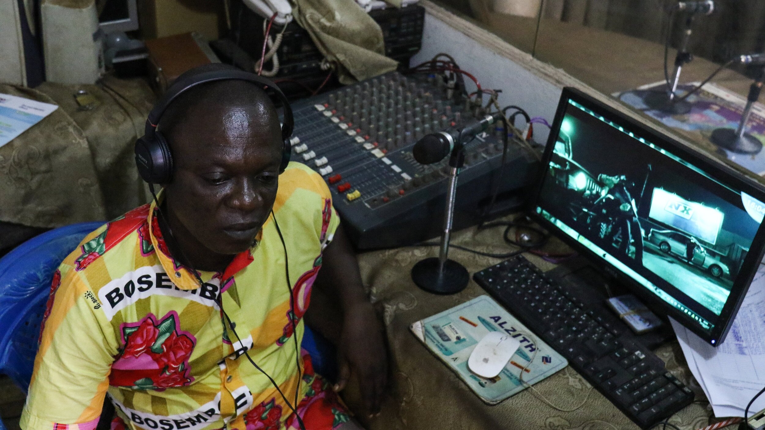  Guy, a Congolese radio journalist, in the studio of Radio Mwana in Mbandaka, DRC  
