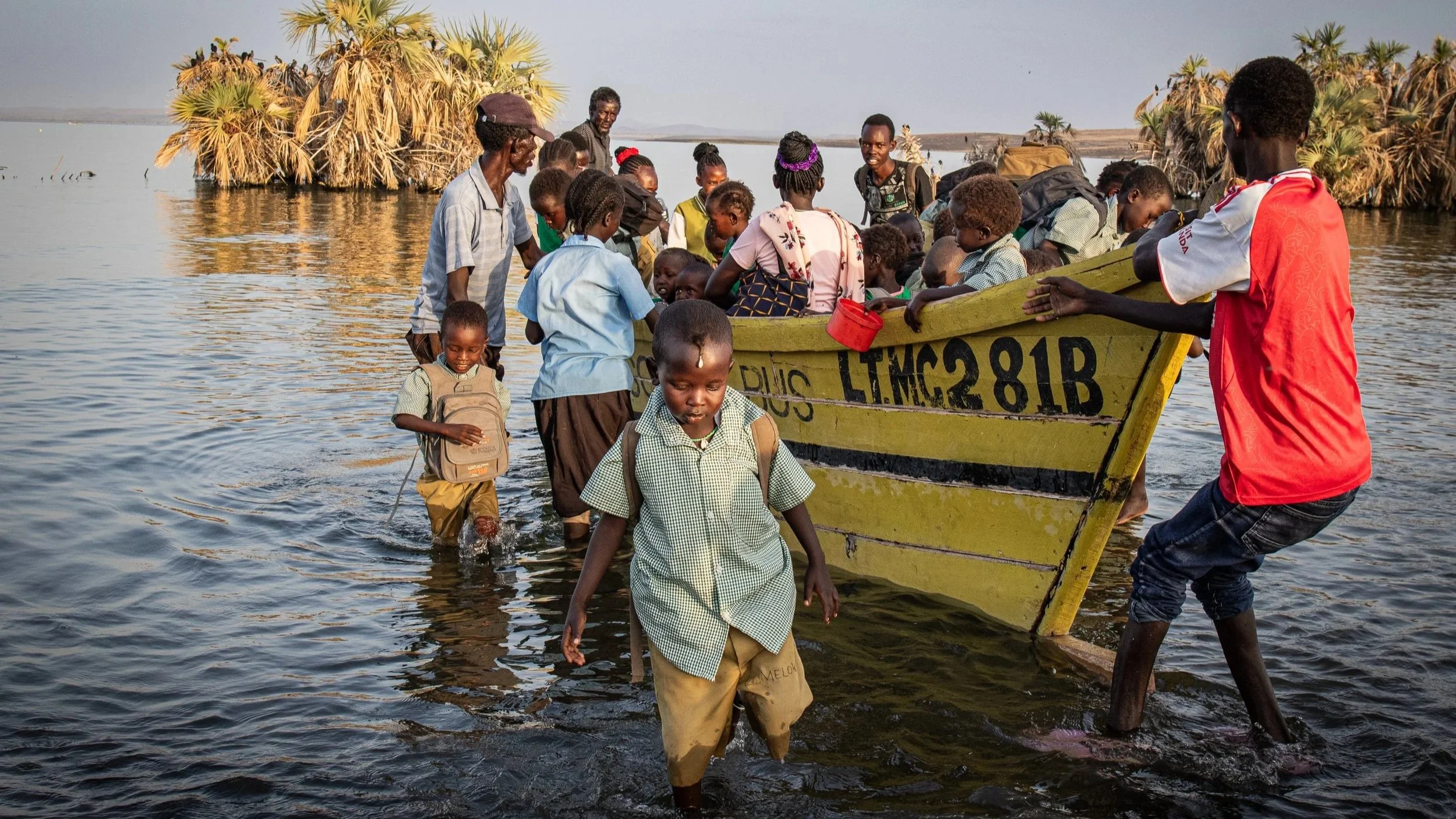  El Molo children on their way to school on Lake Turkana, Kenya 