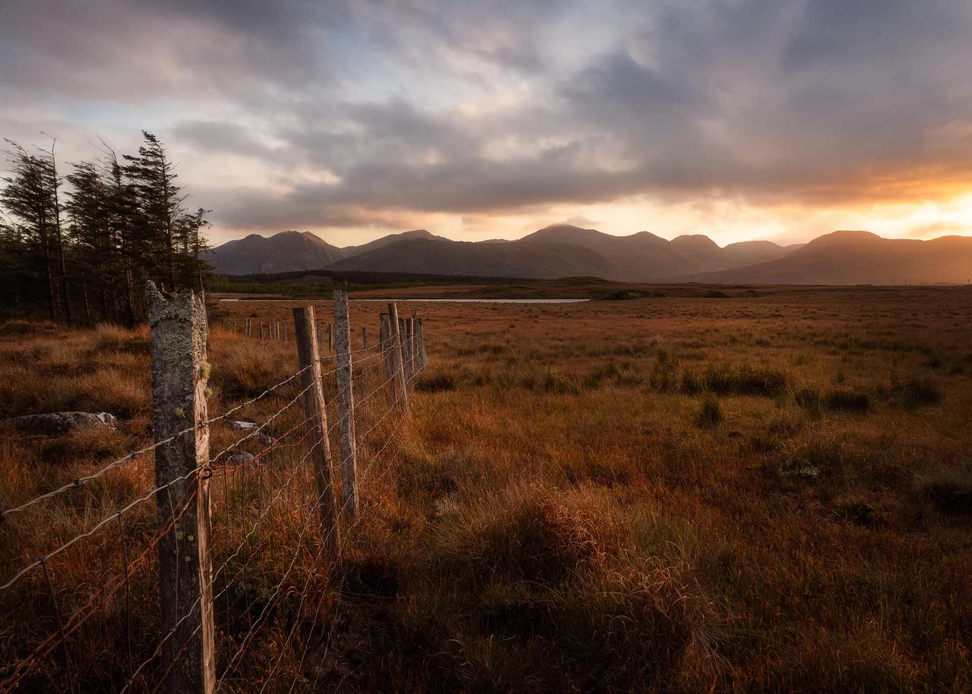 Dramatic skies in Connemara, Co Galway. If you look at the trees on the left, the mountain closest to them is what I shot at 100mm in the previous image. That will give you an idea of the versatility of this lens.