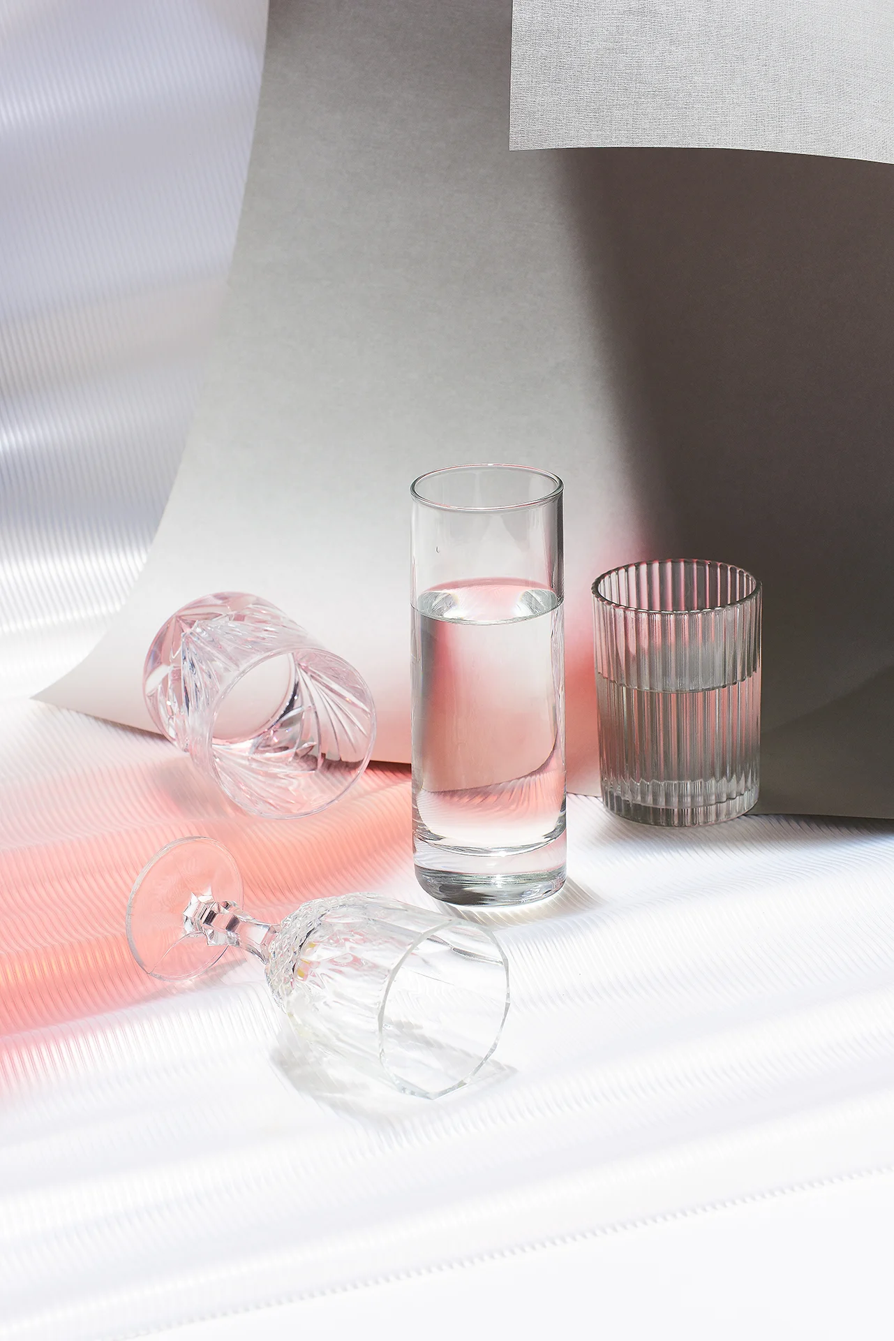  A photo with glasses of water and color reflections 