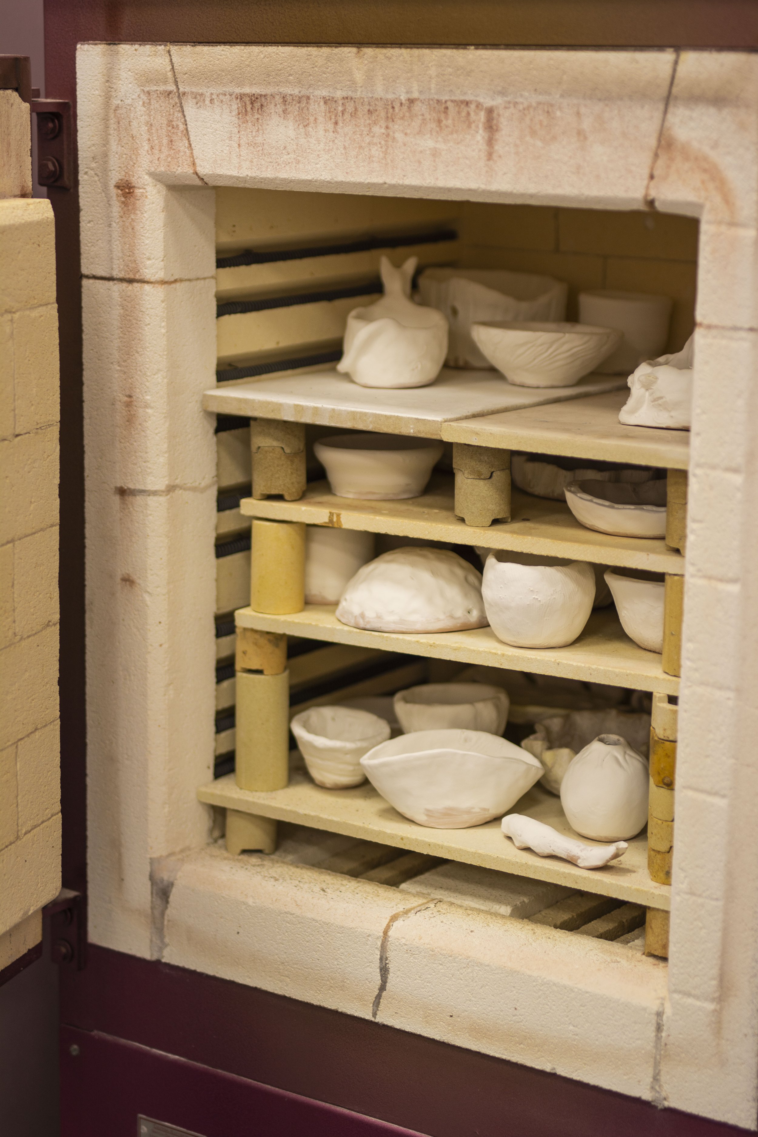  Norwich Pottery Studio ceramics stacked up ready to be fired in the kiln - beginners pottery course 