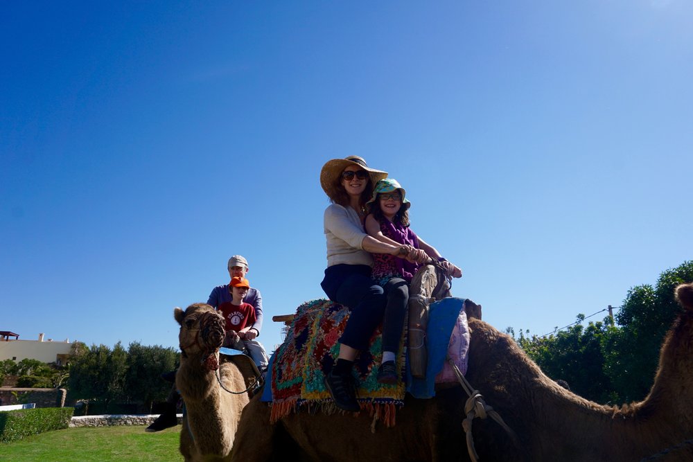 Nadine Meller and family CamelRide Morocco.jpg