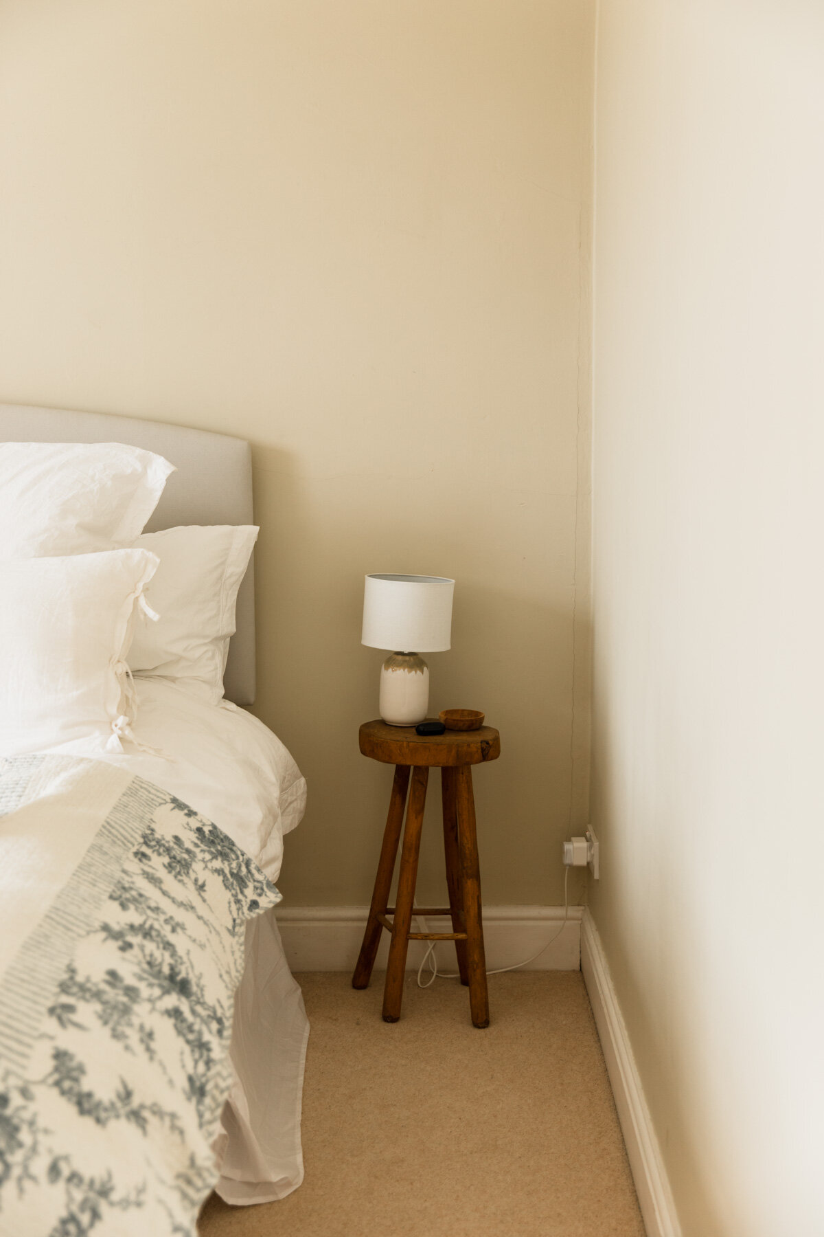 Bedroom with vintage bedside table