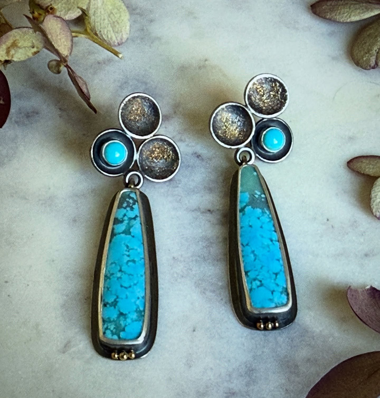 Been on a little turquoise earring kick. Mixed with gold dust and oxidized silver&mdash;🤩🤩🤩 
Find these Arizona beauties and more on the website. Kingman and sleeping beauty mines represented. 
#ooakearrings #turquoiseearrings