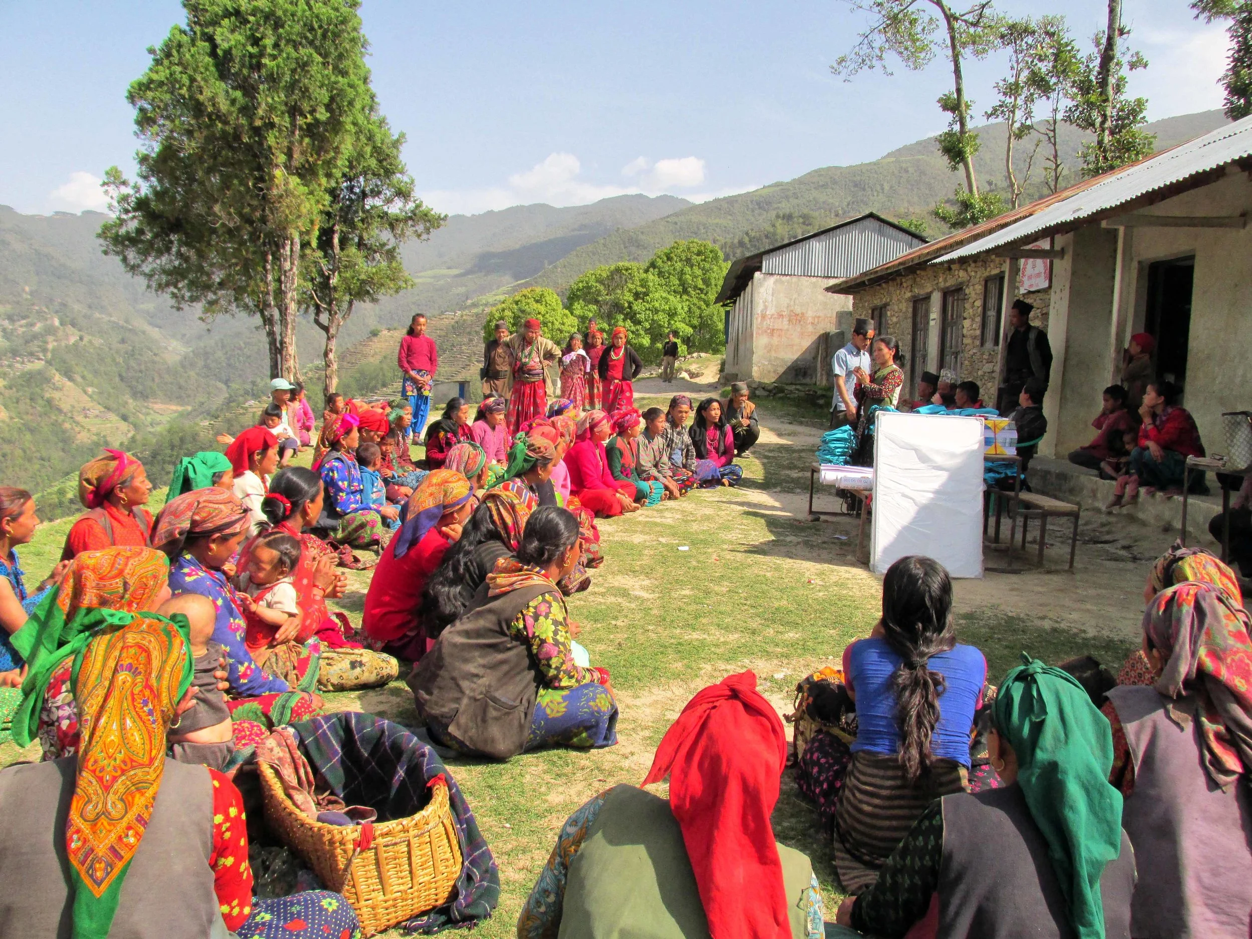Women from Chipling Village enjoying their literacy class with a view