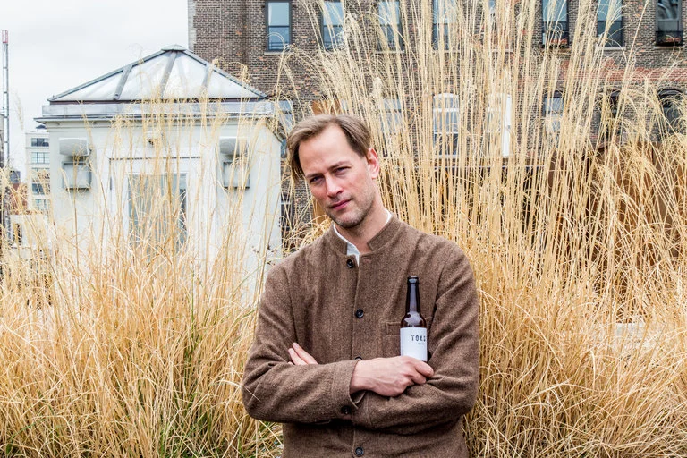 Tristram Stuart, the driving force behind rescuing wasted bread and turning it into pale ale. Photo by Devin Yalkin for The New York Times.