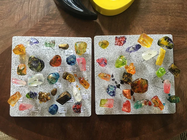 Sweet Saba candies laid out like butterflies in a museum. Photo by Larissa Zimberoff.
