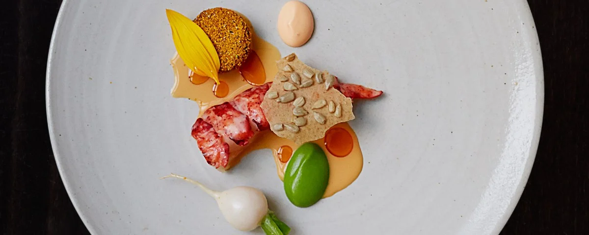 Lobster and sunflower head. Photo by Signe Birke .