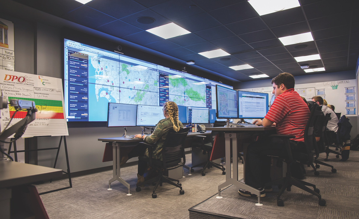 Logistics techs at Anheuser-Busch tracking deliveries.