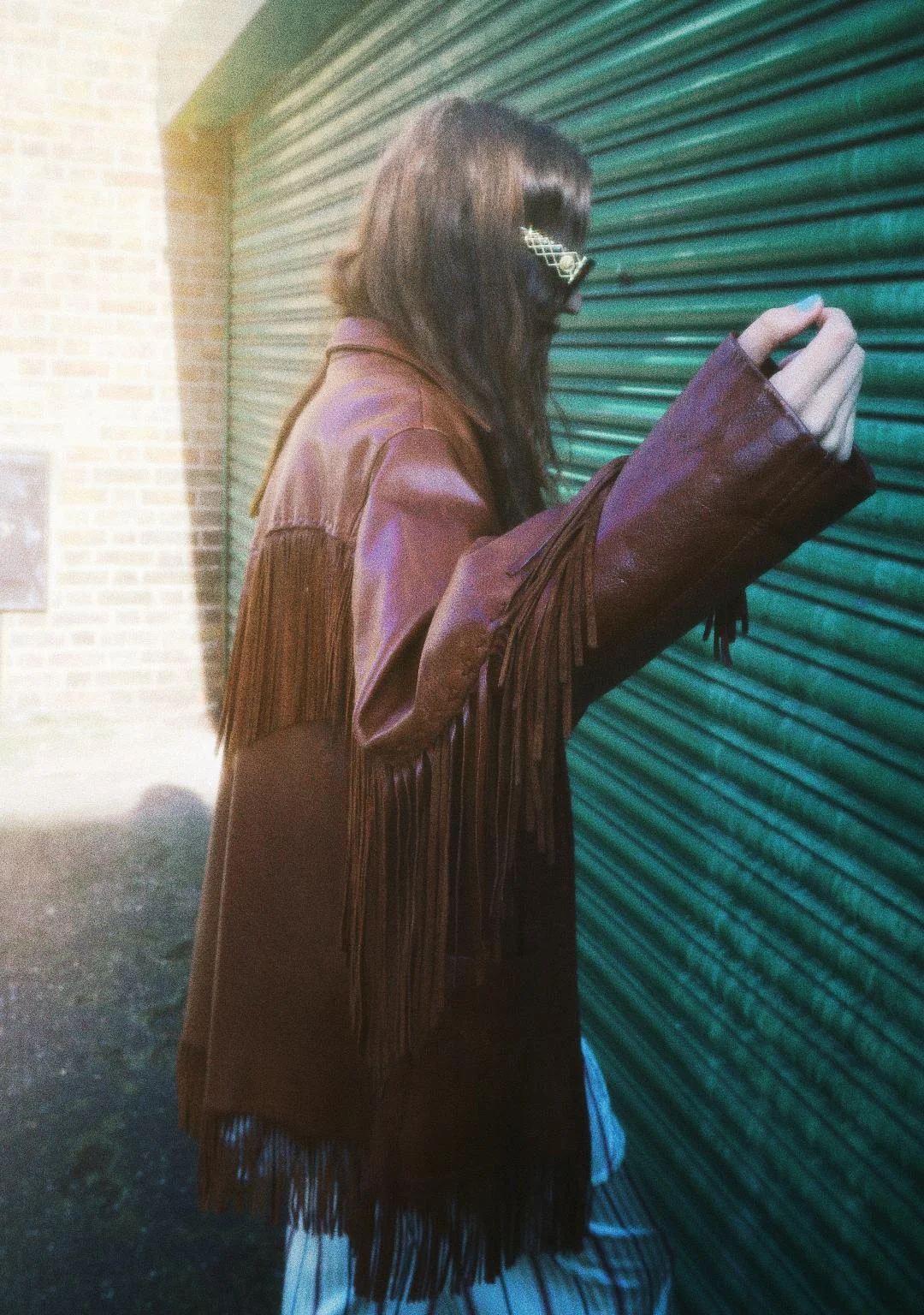 Leather fringe coat .jpg