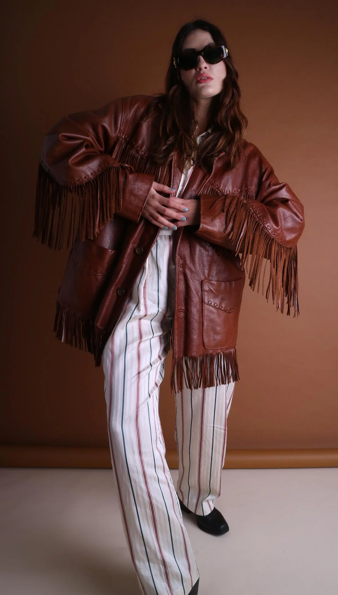 vintage leather fringe jacket .jpg